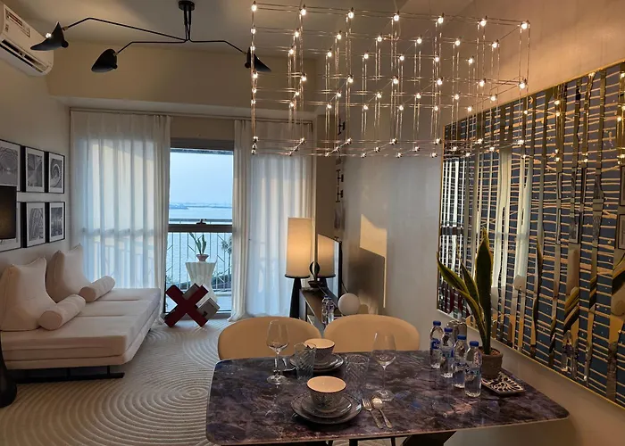 Modern 1br With Balcony Facing Infinity Pool Bay Sunset Near Airports Okada Solaire Moa Apartment Manila