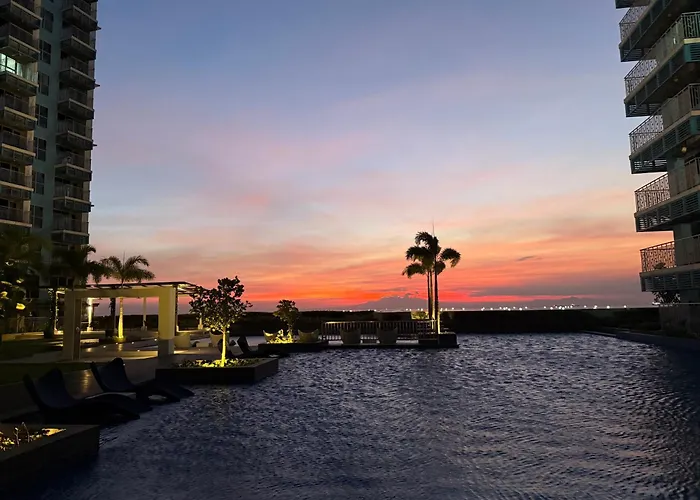 Modern 1br With Balcony Facing Infinity Pool Bay Sunset Near Airports Okada Solaire Moa Apartment
